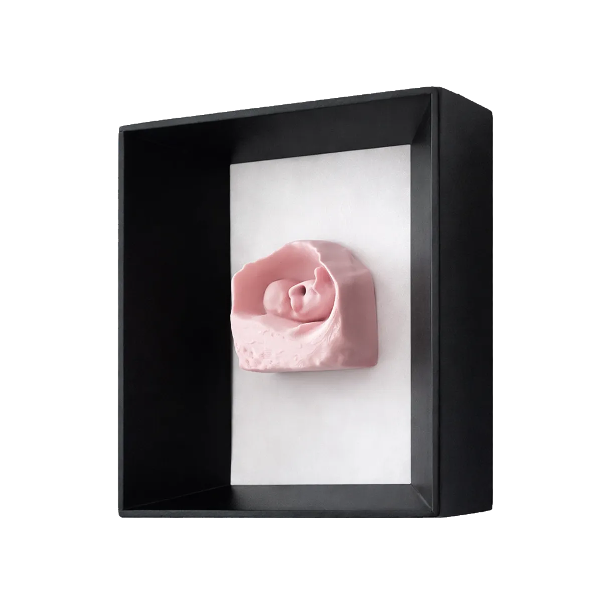 A framed Wombra sculpture